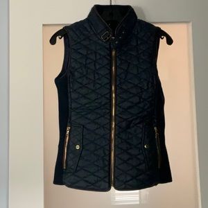 Navy leatherette vest with gold zippers